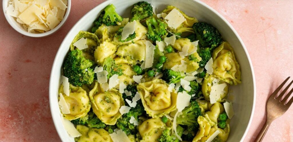 Tortellini and broccoli with parmesan cheese in a Bowl