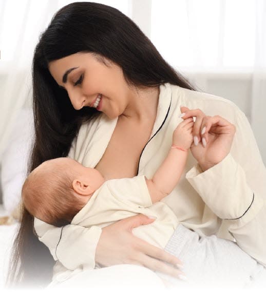 woman breastfeeding a baby
