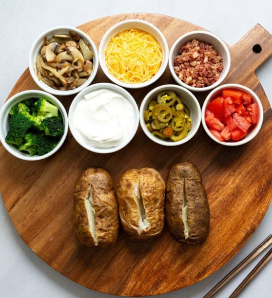 Baked Potato Bar for the Whole Family on a wooden plate