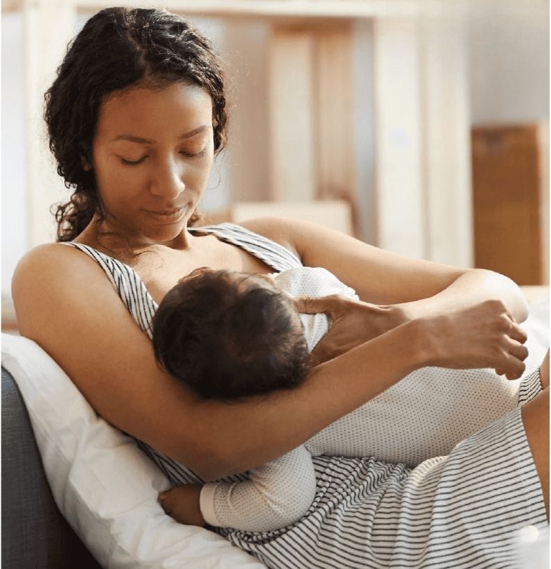 A mom breastfeeding her baby