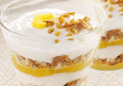 Breakfast parfait with fresh fruit in a cup
