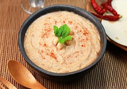 Creamy Spiced Hummus in a stone bowl